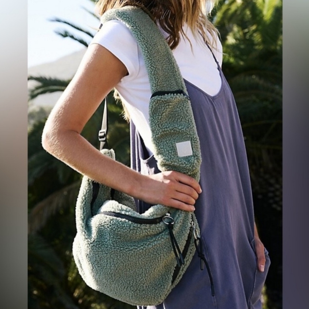 FP Movement by Free People Overachiever sling bag in Dusty Sage